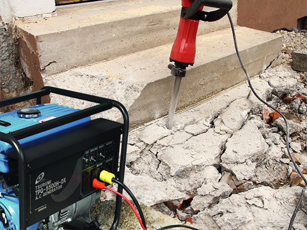 photo of portable generator powering jackhammer